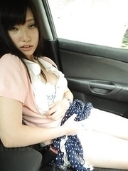 Nasty Riko Tabe shows hairy pussy and sucks a cock in the car.
